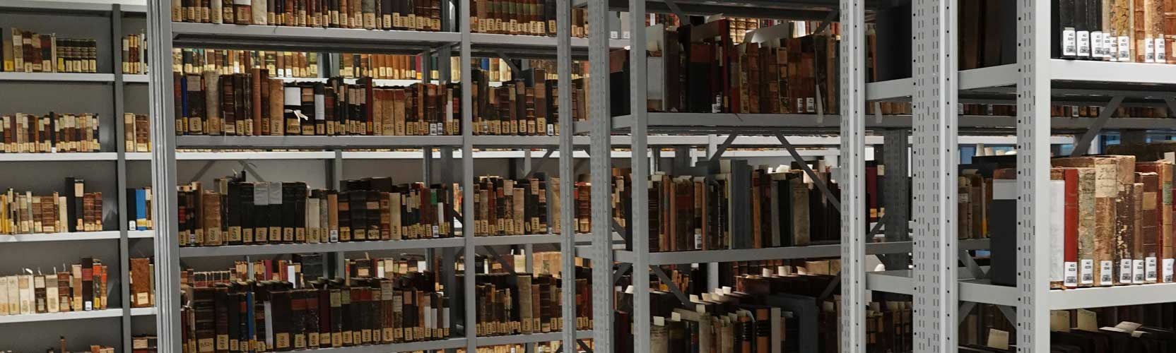 Shelves with old prints